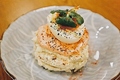 料理メニュー写真 半熟卵と明太子マヨのあぶりポテトサラダ