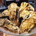 料理メニュー写真 石巻産殻付き牡蠣（生・蒸）