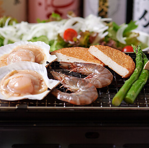 職人魂の炭火焼肉と卓上海鮮網焼きを愉しむ酒場◆多彩な日本酒や貸切宴会もお任せ◎