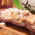料理メニュー写真 【名物】豚バラ串の土手焼き