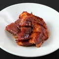 料理メニュー写真 国産豚使用　サンザシ入りハチミツソースの窯焼きロースト生チャーシュー
