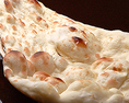 ビンドゥこだわりナン　【サダナン】 小麦粉にヨーグルト、牛乳を加え、タンドールで焼いたインドのパン
