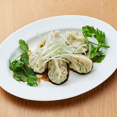 水餃子のネギソースがけ