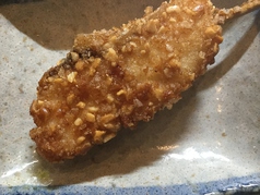 ぶりの醤油漬け柿ピー衣揚げ