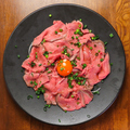 料理メニュー写真 牛肉のカルパッチョユッケ