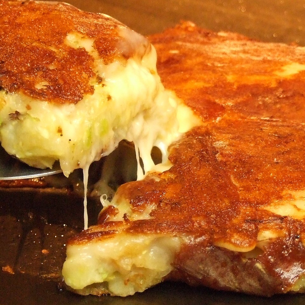 当店女性に一番人気のチーズ焼き。8種類のチーズからお選びいただけるという贅沢な逸品。