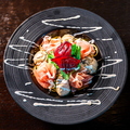 料理メニュー写真 牡蠣と生ハムとルッコラのアーリオ・オーリオ スパゲッティ ゴルゴンゾーラの香り 