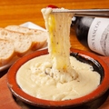 料理メニュー写真 アリゴチーズの伸び～るポテサラ