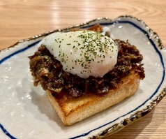 名物２！牛すじの煮込み焼きの写真