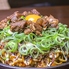 お好み焼き鉄板酒場 どろのロゴ