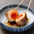 料理メニュー写真 半熟玉トロ豚焼き串