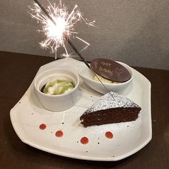 クーポン利用でデザートプレート無料チョコプレートにメッセージ書きますの写真