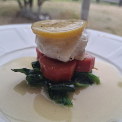 3月のおすすめ 舌平目の蒸し焼き レモン風味 自家栽培 金時人参添えの写真