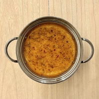 辛さが選べる鶏白湯と豚骨スープ