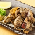 料理メニュー写真 鶏もも藁焼き