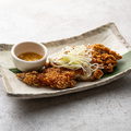 料理メニュー写真&nbsp;でっかい鶏唐！ジューシー揚げ～塩にんにくソース～