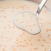 【ごま豆乳スープ】旨味たっぷりの鶏白湯スープと大豆、砂糖、塩のみで作った無添加の豆乳を合わせました。ごまの風味も豊かで健康的なスープです。