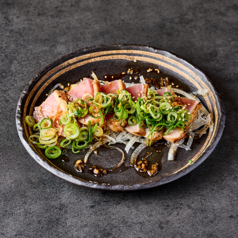 鶏もも藁たたき～よだれ鶏ソース～