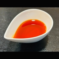 コクと旨味が凝縮したオーナーシェフ特製自家製辣油