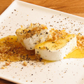 料理メニュー写真 イタリア産ゴルゴンゾーラチーズのレアケーキ　～オレンジミエーレ添え～