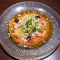 料理メニュー写真 宮城県産銀王サーモンと魚介のカルパッチョ