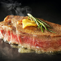 料理メニュー写真 牛サーロインの香草ステーキ