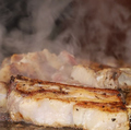 料理メニュー写真 上川産豚スペアリブの香草（オレガノ）焼き