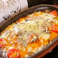 料理メニュー写真 オイルサーディンのトマトチーズ焼