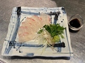 料理メニュー写真 香味野菜とごま油で食す鯛