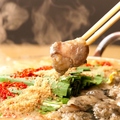 料理メニュー写真 季節ごとの旬の食材をふんだんに使用したお鍋。深いコクと繊細な味わいが特徴で、心も体も温まります。