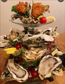料理メニュー写真 オリーブ特選  産地直送 牡蠣タワー  三種ソース添え