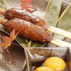 《看板メニュー》比内地鶏の親子つくね焼きの写真