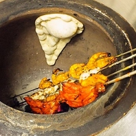 高温の窯が命。熟練のシェフが焼き上げる「究極の食感」