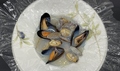 料理メニュー写真 ムール貝とアサリの白ワイン蒸し　カルタファタ包み