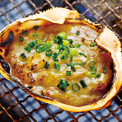 豪快に味わう海鮮浜焼きの香ばしさ〜蟹味噌甲羅焼〜の写真