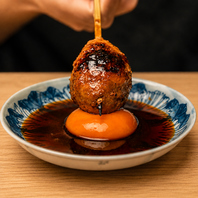 濃厚卵黄と特製ダレで味わう炭火香る自慢の手ごねつくね