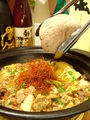 料理メニュー写真 名物牛すじとキャベツの火山煮込み