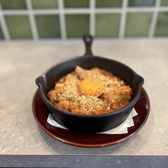 トリッパのトマト煮込み 卵黄のせ