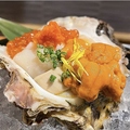 料理メニュー写真 岩牡蠣痛風盛り(岩牡蠣・雲丹・帆立・いくら)