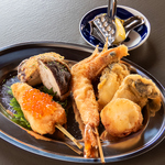 串揚げと京おばん菜が楽しめる隠れ家的スポット。静かな雰囲気で、心温まる料理をお楽しみください。