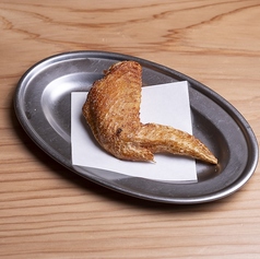 新名物！無限に食べられる手羽からあげ 1本の写真
