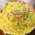 料理メニュー写真 自家製厚切りベーコンと蘭王卵のカルボナーラ