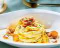 料理メニュー写真 地鶏と焼きトウモロコシのクリームパスタ