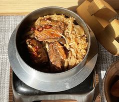 高木商店の焼き鯖アヒージョ釜飯