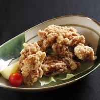 お酒が進む！肉汁溢れるこだわりの特製生姜から揚げ