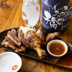 鶏の炭火焼き(ガイヤーン)×日本酒の写真