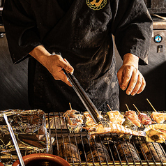 炉ばた席!目の前で豪快に焼きます