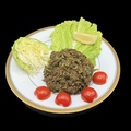 料理メニュー写真&nbsp;干しマトン肉と茶葉の和え物