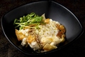 料理メニュー写真 温玉と鶏そぼろのポテトサラダ