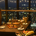 夜景の綺麗なテーブル席はデートのご利用におすすめ◎